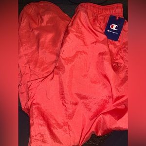 NEON ORANGE CHAMPION TRACK PANTS